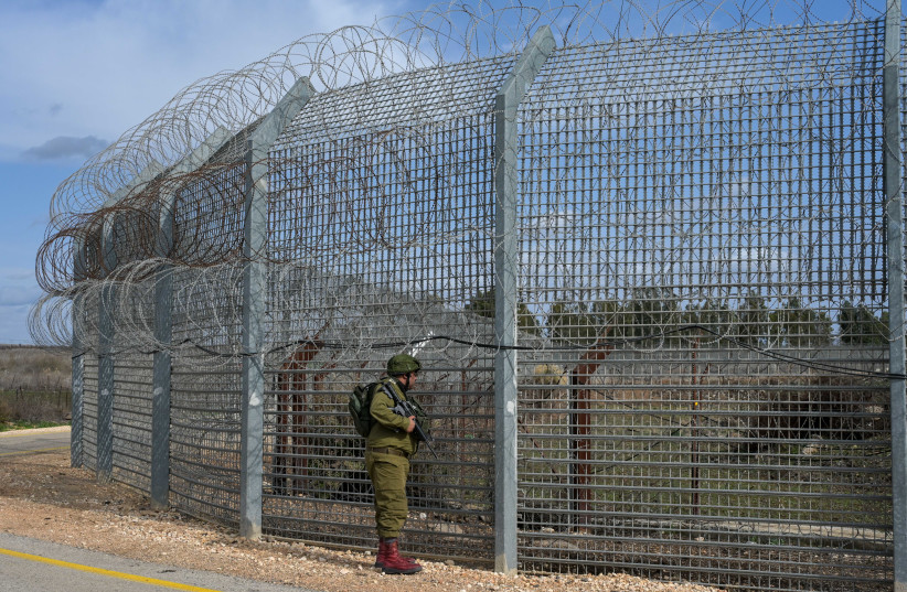 Israeli soldiers patrol the area following this morning's border incident at the border fence with Syria, in southern Golan Heights, on January 29, 2023.