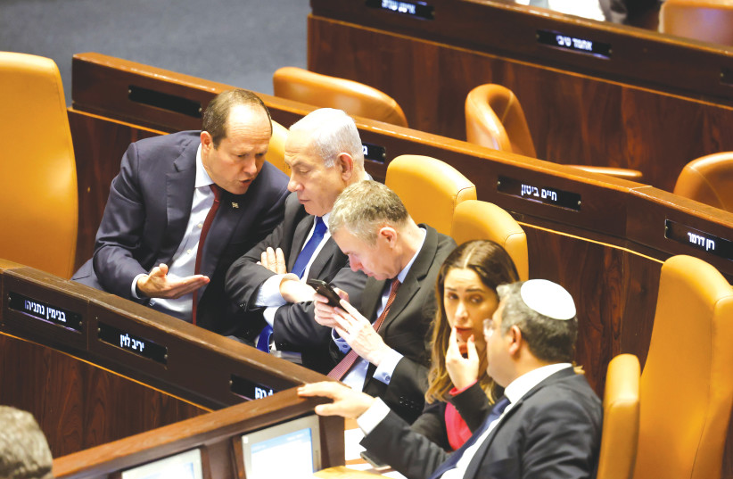  PRIME MINISTER Benjamin Netanyahu and members of his coalition are deep in discussion in the Knesset this week. (photo credit: MARC ISRAEL SELLEM)