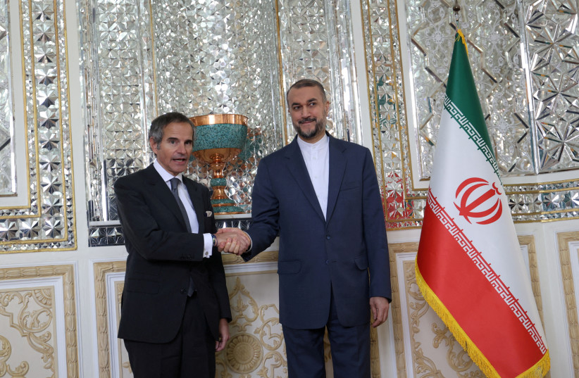  International Atomic Energy Agency (IAEA) Director General Rafael Grossi meets with Iran's Foreign Minister Hossein Amir-Abdollahian in Tehran, Iran, March 4, 2023.  (photo credit: MAJID ASGARIPOUR/WANA/REUTERS)