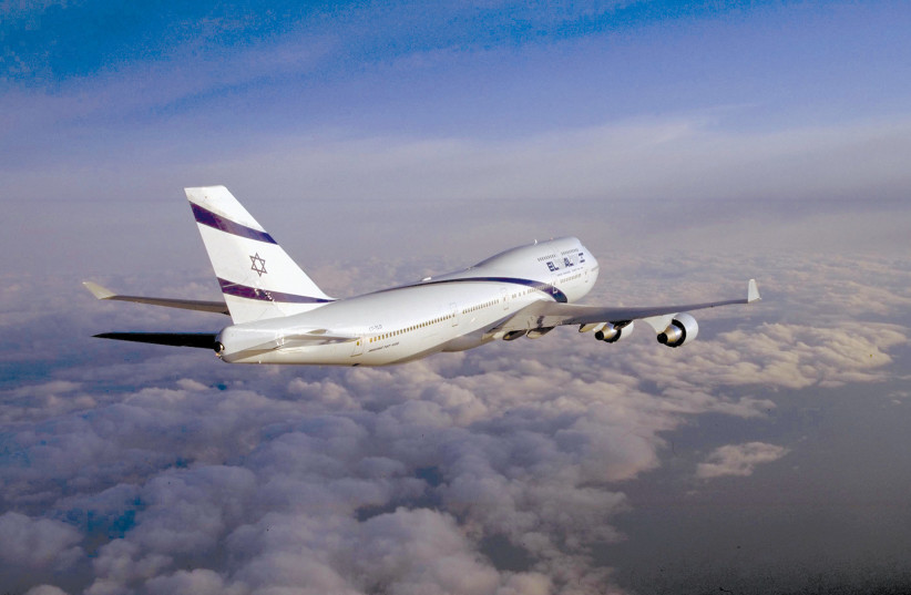  An El Al plane flying above the clouds. (photo credit: IPTC/GPO)