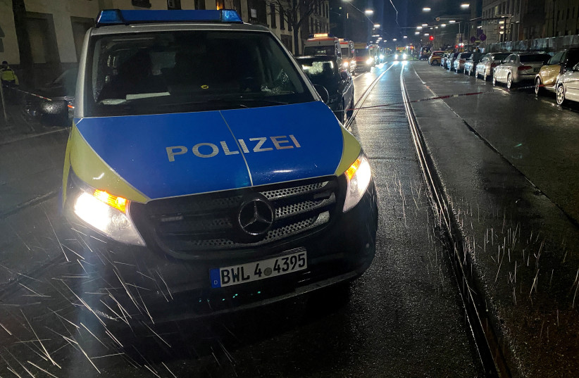  German police block streets at the scene of a hostage situation at a pharmacy in the western German city of Karlsruhe, Germany, March 10, 2023. Police in Karlsruhe cordoned off an area in the central part of the city and urged residents to avoid the area.  (credit: REUTERS/TILMAN BLASSHOFER)