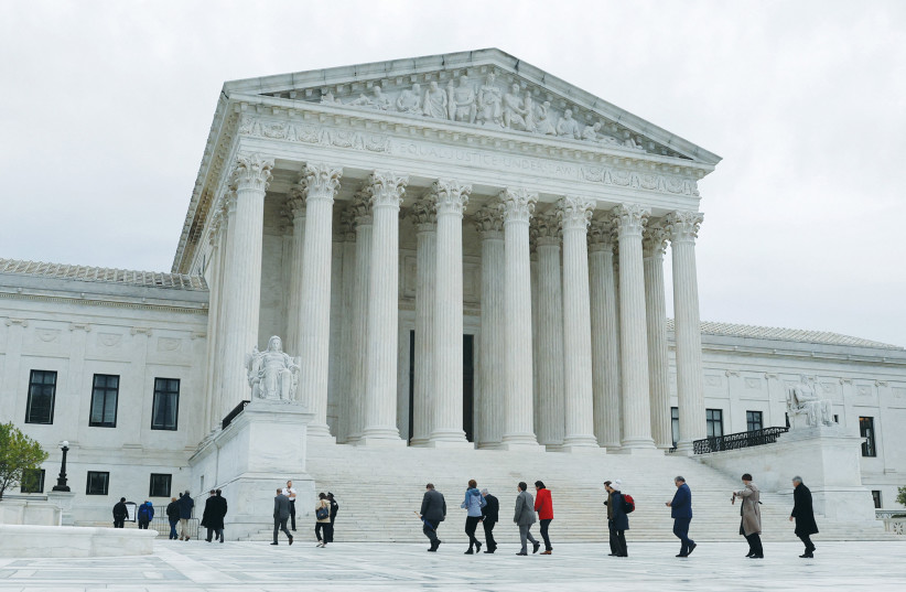  THE US Supreme Court building in Washington: As many in Israel believe today, the Anti-Federalists, who opposed the constitution, objected to governorship by the court and feared such power granted to the court could render it an absolute ruler.  (photo credit: REUTERS/JONATHAN ERNST)
