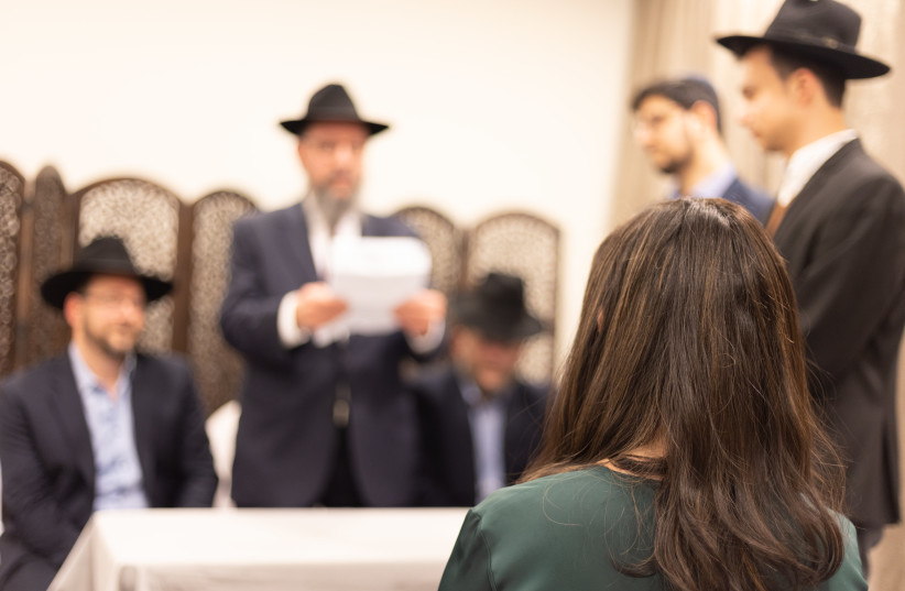  A WOMAN seeking divorce in a ‘beit din’ was the sole female in the room until the advent of ‘toanot.’ (Illustrative) (credit: Laura Ben David, Jewish Life Photo Bank)