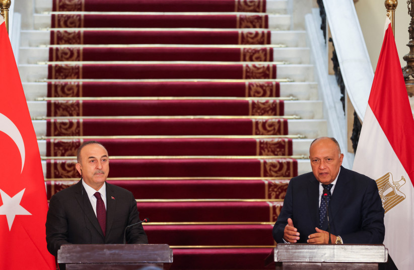  Turkish Foreign Minister Mevlut Cavusoglu and Egyptian Foreign Minister Sameh Shoukry attend a news conference in Cairo, Egypt March 18, 2023. (photo credit: REUTERS/MOHAMED ABD EL GHANY)