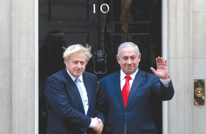  THEN-BRITISH prime minister Boris Johnson welcomes Prime Minister Benjamin Netanyahu to Downing Street, in 2019.  (photo credit: Hannah McKay/Reuters)