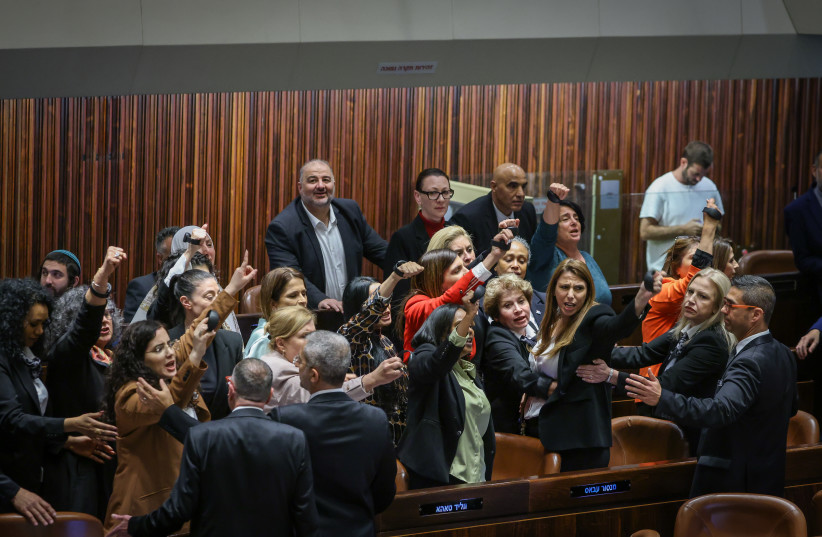  Israeli MKs are seen in the Knesset plenum following a day of voting on March 22, 2023 (photo credit: NOAM MOSKOVITZ/KNESSET)