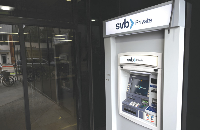  THE SVB Private logo is displayed on an ATM outside of a Silicon Valley Bank branch in Santa Monica, California on Monday.  (photo credit: PATRICK T. FALLON/AFP via Getty Images)