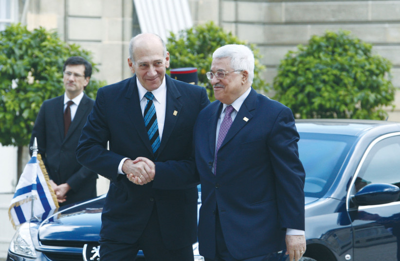  EHUD OLMERT implored Mahmoud Abbas to embrace the role of historic peacemaker: ‘It will be 50 years before there will be another Israeli prime minister that will offer you what I am offering you now,’ he said.  (photo credit: THAER GANAIM/FLASH90)