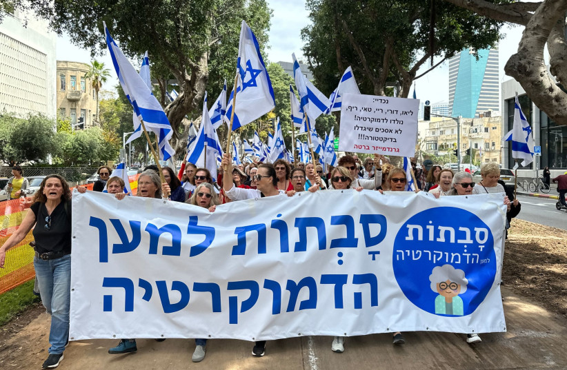 Grandmothers for Democracy march in Tel Aviv on March 22, 2023. (photo credit: Stav Tsur)