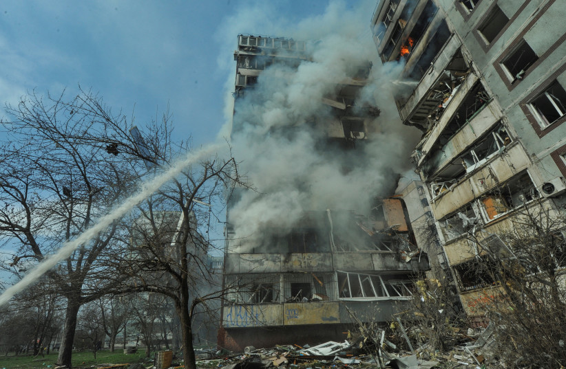  A view shows a residential building damaged by a Russian missile strike, amid Russia's attack on Ukraine, in Zaporizhzhia, Ukraine March 22, 2023. (photo credit: REUTERS/STRINGER)
