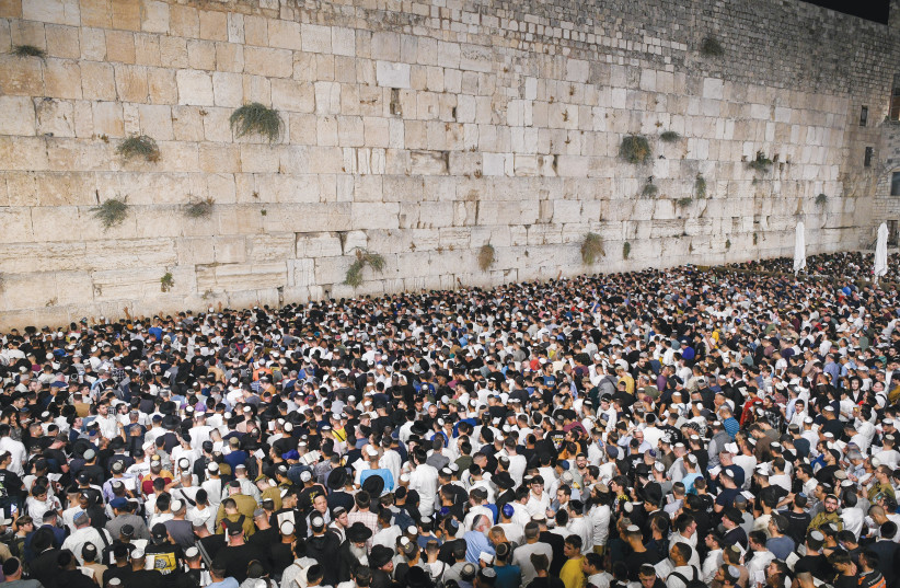  THE MASSES gather at the Western Wall, the day before Yom Kippur, this past year. We fail to appreciate the miracle that Jews are thriving together in Israel nearly two thousand years after the destruction of the Second Temple.  (photo credit: ARIE LEIB ABRAMS/FLASH 90)