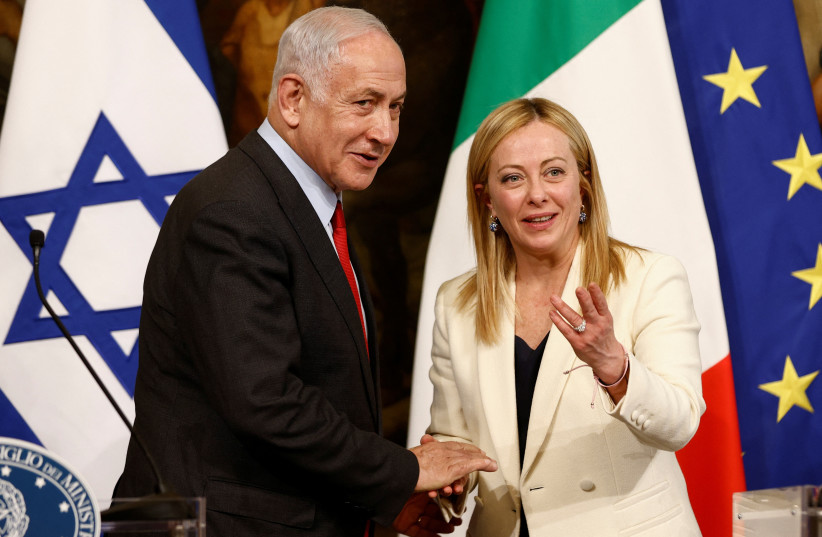 Italian Prime Minister Giorgia Meloni and Israeli Prime Minister Benjamin Netanyahu shake hands during a news conference after their meeting at Palazzo Chigi, in Rome, Italy, March 10, 2023.  (photo credit: REUTERS/GUGLIELMO MANGIAPANE)