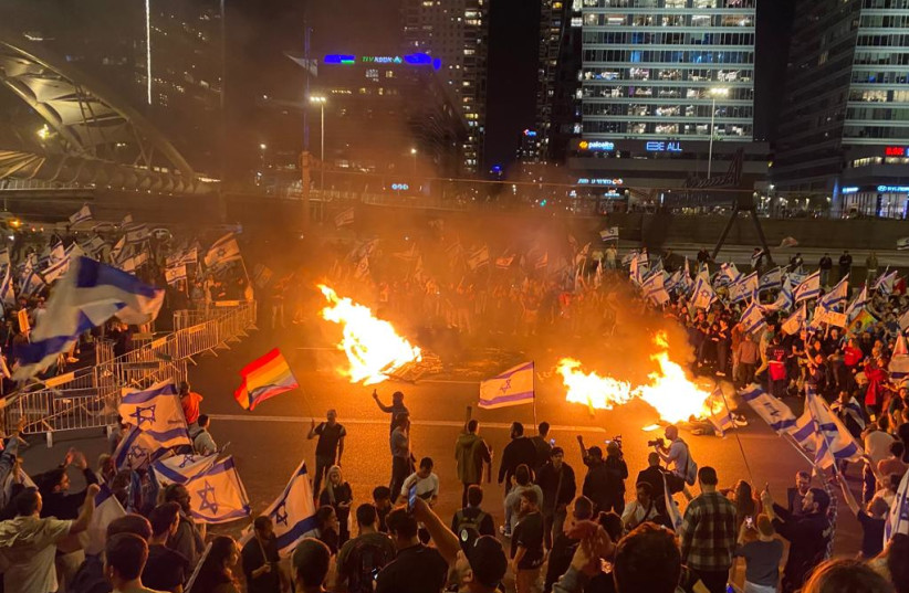 Thousands of Israelis gather in Tel Aviv in protest following Prime Minister Benjamin Netanyahu's firing of Defense Minister Yoav Gallant, on March 26, 2023.