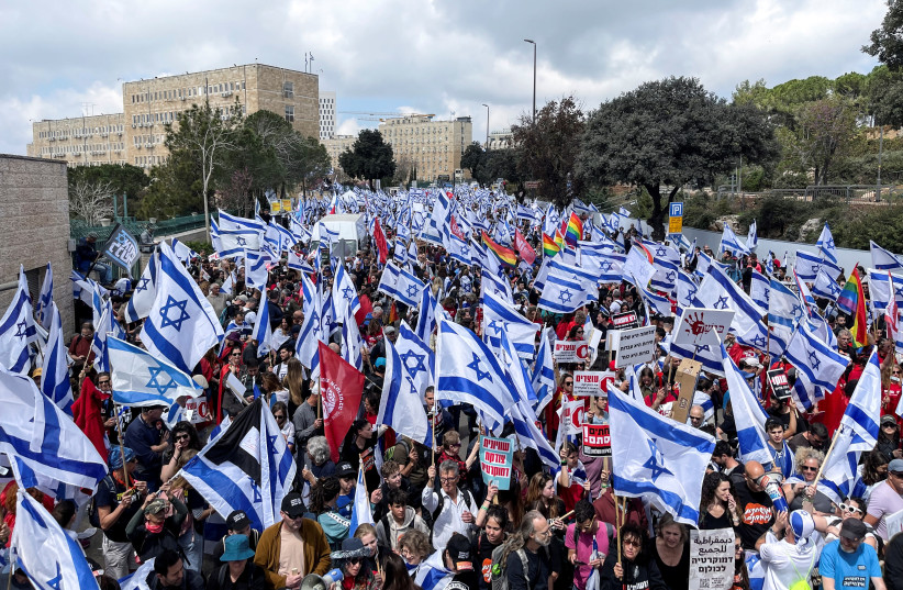  Israeli protesters attending a demonstration against the Israeli government's judicial overhaul, in Jerusalem, March 27, 2023 (photo credit: REUTERS/ILAN ROSENBERG)