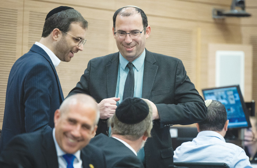  THE WRITER shares a light moment at the Knesset Constitution, Law and Justice Committee, on Sunday (photo credit: YONATAN SINDEL/FLASH90)