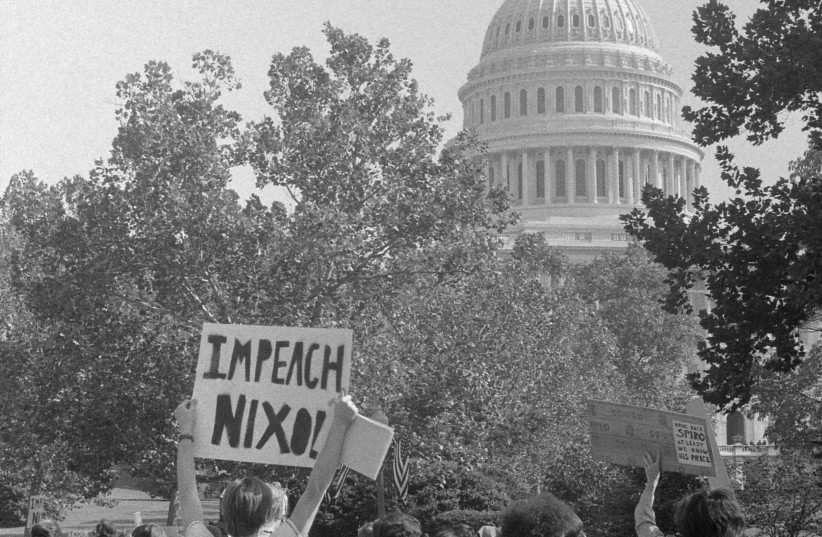 Demonstrators in Washington, DC, with a sign reading "Impeach Nixon" (photo credit: MARION S. TRIKOSKO OR THOMAS J. O'HALLORAN/PUBLIC DOMAIN/VIA WIKIMEDIA COMMONS)