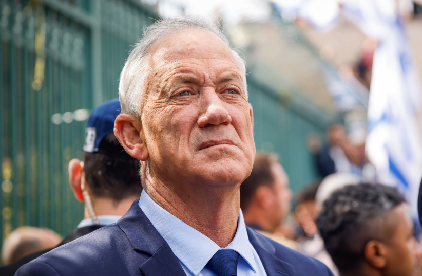 MK Benny Gantz seen during a protest outside the Israeli parliament in Jerusalem, against the government's planned judicial overhaul, on March 27, 2023. (credit: ERIK MARMOR/FLASH90)