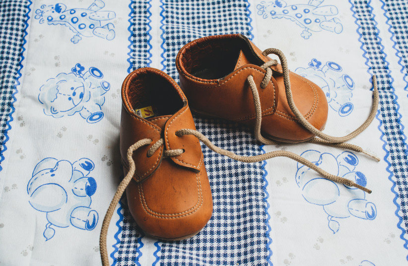  When should your child be learning to walk? And when should you buy them shoes? (illustrative) (photo credit: PEXELS)