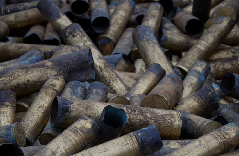  Used Russian artillery shells are seen at a compound of an international airport after Russia's retreat from Kherson, in Chornobaivka, outside of Kherson, Ukraine November 16, 2022. (photo credit: REUTERS/VALENTYN OGIRENKO)