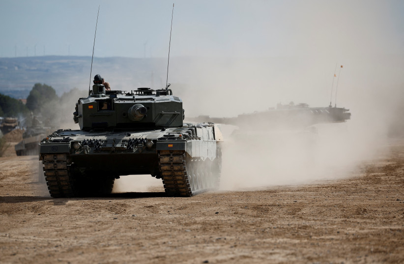  Members of the Spanish Armed Forces give training to Ukrainian military personnel in the operation and maintenance of Leopard battle tanks, at San Gregorio Training Center in Zaragoza, Spain, March 13, 2023. (photo credit: REUTERS/JUAN MEDINA)