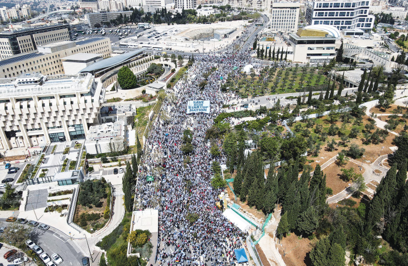  AN AERIAL view shows protesters attending the massive demonstration in Jerusalem on Monday against the judicial overhaul.  (photo credit: REUTERS)