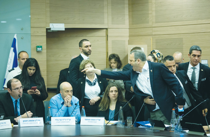  OPPOSITION MK Gilad Kariv points an accusing finger at Knesset Constitution, Law and Justice Committee chairman Simcha Rothman. The opposition should be viewed as a loyal opposition and not the enemy, says the writer. (photo credit: YONATAN SINDEL/FLASH90)