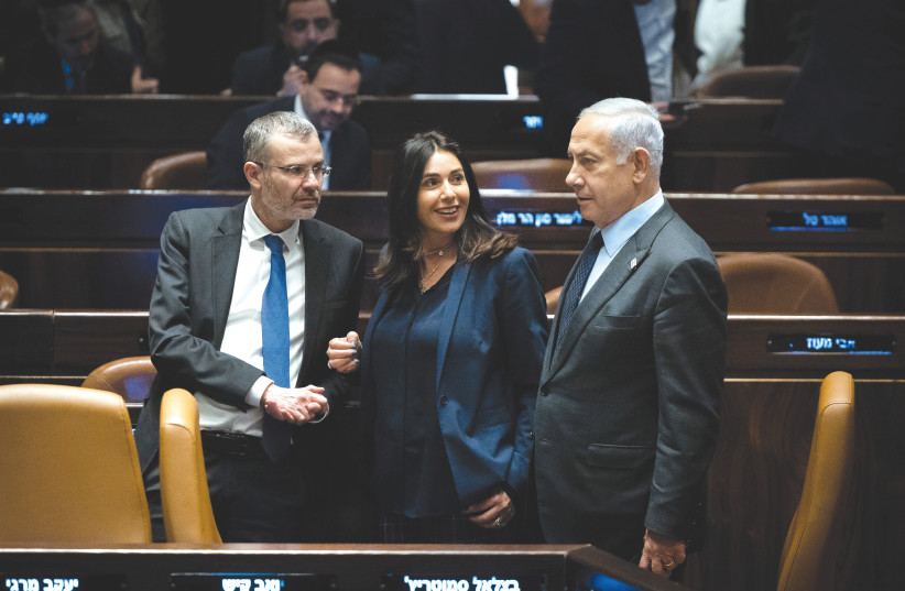  PRIME MINISTER Benjamin Netanyahu chats with cabinet ministers Yariv Levin and Miri Regev in the Knesset plenum, last week. The prime minister is not in control of events, the writer argues. (photo credit: YONATAN SINDEL/FLASH90)