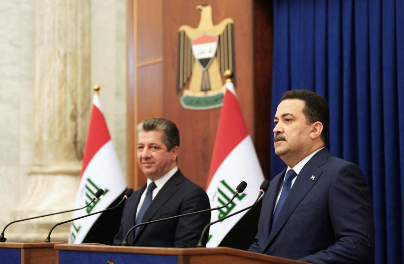  Iraqi Prime Minister Mohammed Shia al-Sudani holds a joint news conference with his Kurdish counterpart Masrour Barzani in Baghdad, Iraq April 4, 2023. (credit: IRAQI PRIME MINISTER MEDIA OFFICE/HANDOUT VIA REUTERS)
