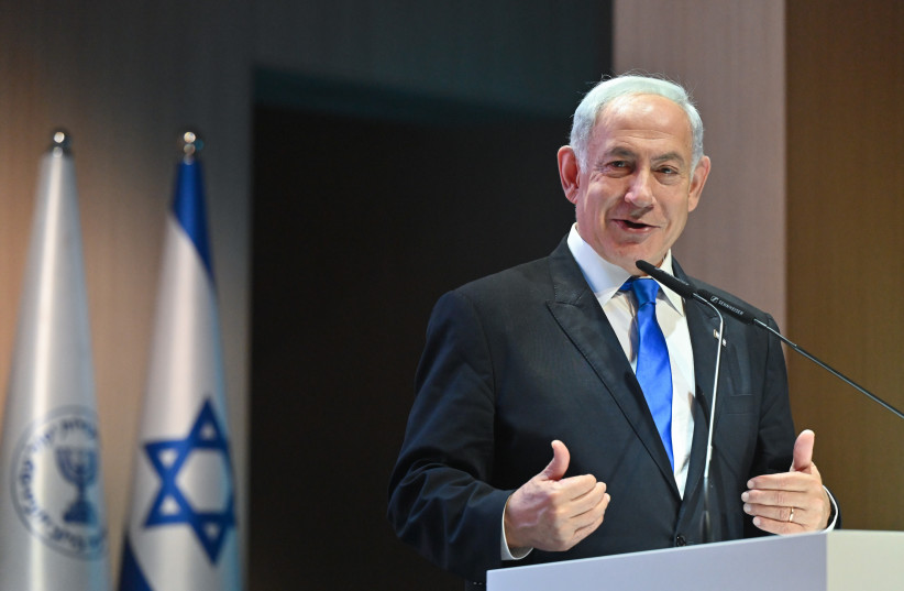  Israeli Prime Minister Benjamin Netanyahu is seen speaking at a pre-Passover toast, on April 4, 2023. (photo credit: KOBI GIDEON/GPO)