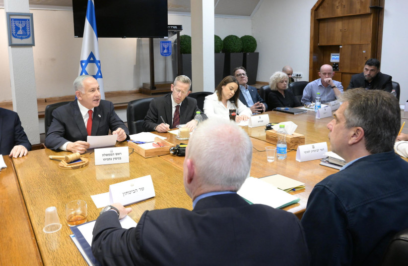  Prime Minister Benjamin Netanyahu convenes a security cabinet meeting on April 6, 2023 (credit: AMOS BEN-GERSHOM/GPO)