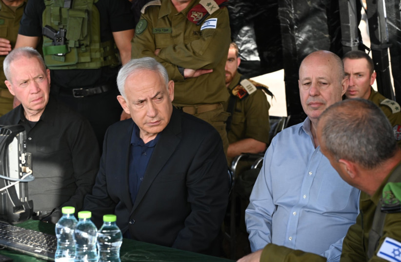  Defense Minister Yoav Gallant and Prime Minister Benjamin Netanyahu are seen on April 7, 2023 (photo credit: HAIM ZACH/GPO)