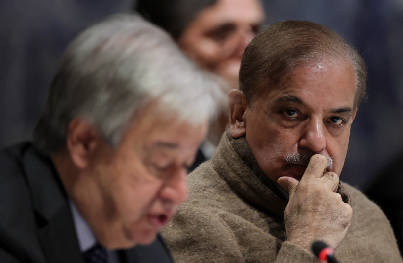  Pakistan's Prime Minister Shehbaz Sharif and United Nations Secretary General Antonio Guterres attend a summit on climate resilience in Pakistan, months after deadly floods in the country, at the United Nations, in Geneva, Switzerland, January 9, 2023.  (photo credit: DENIS BALIBOUSE/REUTERS)
