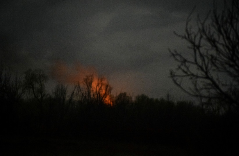  Smoke is seen during a shelling, amid Russia's attack on Ukraine, on the outskirts of the front line city of Bakhmut, Donetsk region, Ukraine April 6, 2023. (photo credit: REUTERS/OLEKSANDR KLYMENKO)