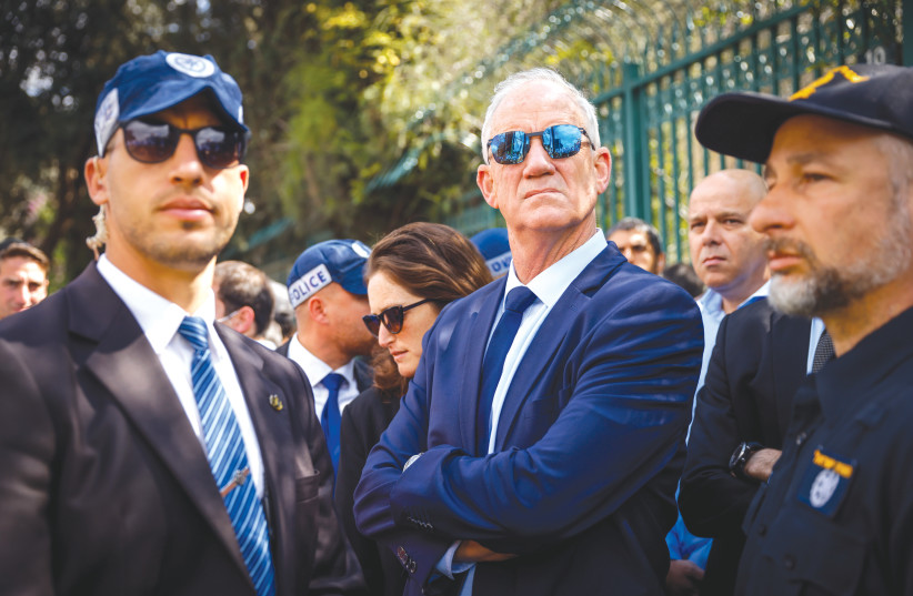  MK BENNY GANTZ is surrounded by a heavy security presence at a protest last month outside the Knesset against the government’s planned judicial overhaul.  (photo credit: ERIK MARMOR/FLASH90)