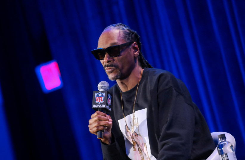  Rapper Snoop Dogg speaks during a news conference about his upcoming performance at the halftime show of Super Bowl LVI in Los Angeles, California, US. February 10, 2022. (photo credit: REUTERS/NATHAN FRANDINO)