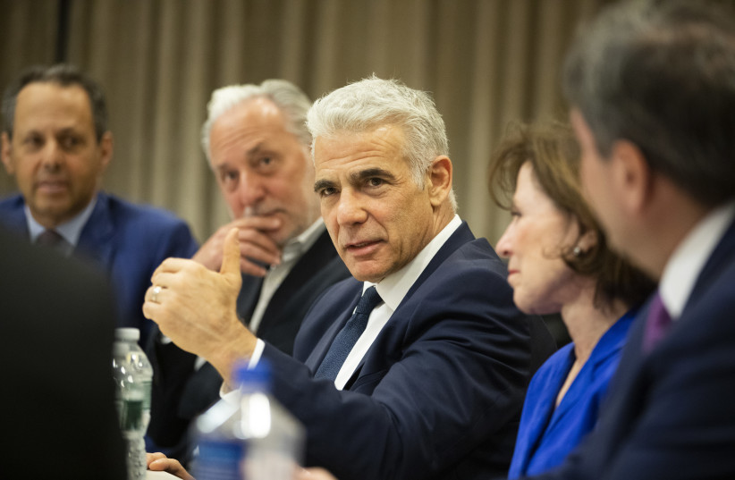 Opposition leader Yair Lapid meets with Jewish leaders in New York City, April 10, 2023. (photo credit: JACKSON KRULE)