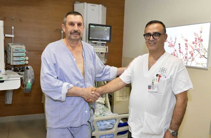 A patient and the nurse who saved his life in the Galilee. (photo credit: RONI ALBERT)