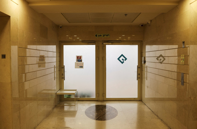  The entrance to an office listed as belonging to Quadream is seen in a high rise building in Ramat Gan, Israel, January 25, 2022. Picture taken January 25, 2022 (photo credit: REUTERS/NIR ELIAS)