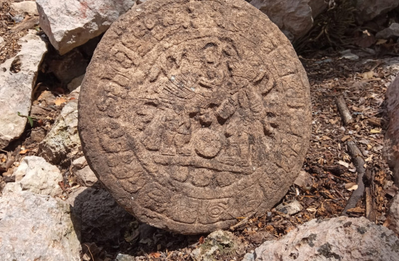  Mexican archaeologists found a circular-shaped Mayan scoreboard used for a ball game at Chichen Itza's archaeological site, Mexican Anthropology and History Institute (INAH), in this handout picture released on April 10, 2023 (photo credit: INAH/Handout via REUTERS)