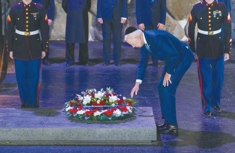  US PRESIDENT Joe Biden lays a wreath in the Hall of Remembrance at Yad Vashem, last July. It is sometimes forgotten that Washington didn’t declare war on the Nazis – it was Hitler who declared war on the US.  (photo credit: OLIVIER FITOUSSI/FLASH90)