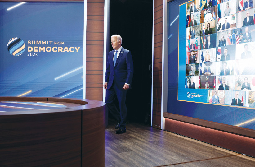  US PRESIDENT Joe Biden arrives to deliver remarks during a virtual Summit for Democracy, which he hosted from the White House, last month. (photo credit: JONATHAN ERNST/REUTERS)