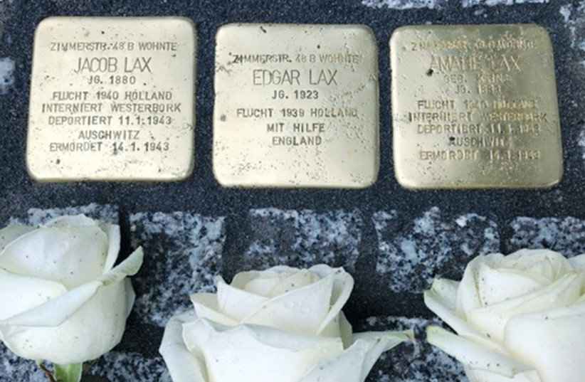  THE STOLPERSTEINE laid in memory of Edgar Lax and his parents Jacob and Amalia Lax, who were murdered in Auschwitz.  (photo credit: Bobby Lax)