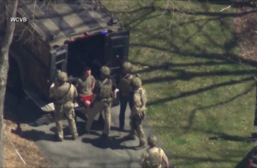  FBI agents arrest Jack Teixeira in connection with an investigation into the leaks online of classified U.S. documents, outside a residence in this still image taken from video in North Dighton, Massachusetts, US, April 13, 2023 (photo credit: WCVB-TV VIA ABC VIA REUTERS)