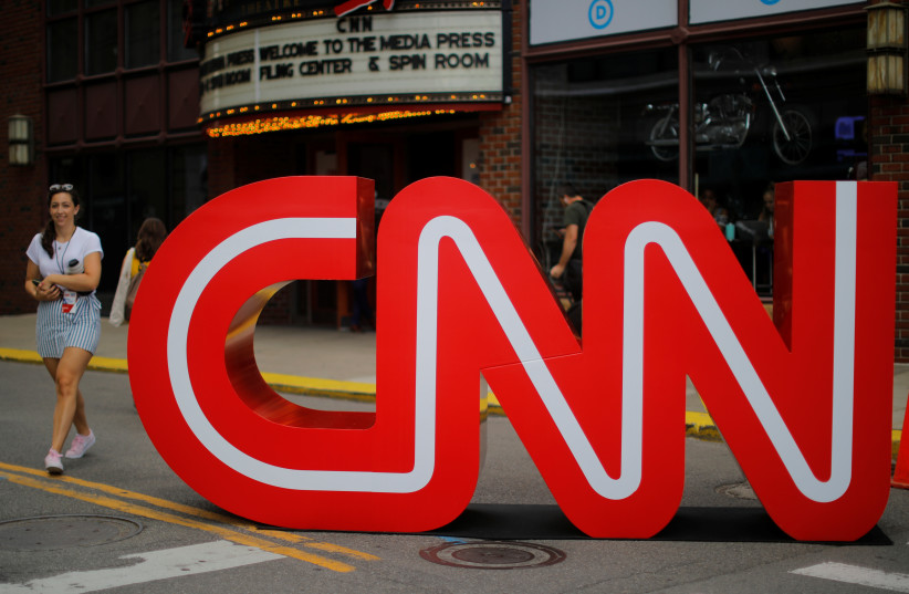  The CNN logo stands outside the venue of the second Democratic 2020 U.S. presidential candidates debate, in the Fox Theater in Detroit, Michigan, US, July 30, 2019.  (credit: REUTERS/BRIAN SNYDER)