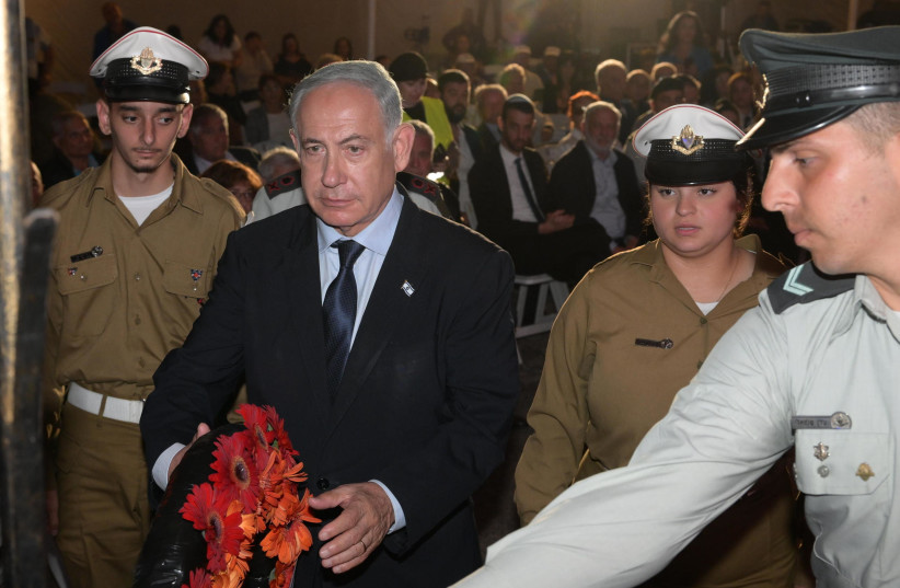  Prime Minister Benjamin Netanyahu seen at an IDF memorial service on April 16, 2023 (photo credit: AMOS BEN-GERSHOM/GPO)