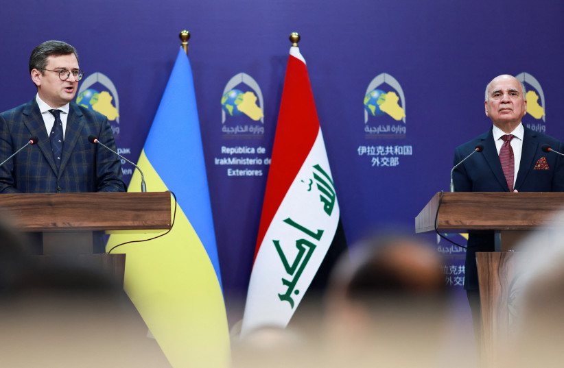 Ukrainian Foreign Minister Dmytro Kuleba and Iraqi Foreign Minister Fuad Hussein hold a joint news conference in Baghdad, Iraq April 17, 2023. (photo credit: THAIER AL-SUDANI/REUTERS)