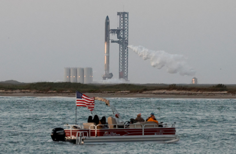 SpaceX's Starship is seen ahead of its lift off from the company's Boca Chica launchpad on an orbital test mission near Brownsville, Texas, U.S. April 17, 2023. (photo credit: JOE SKIPPER/REUTERS)