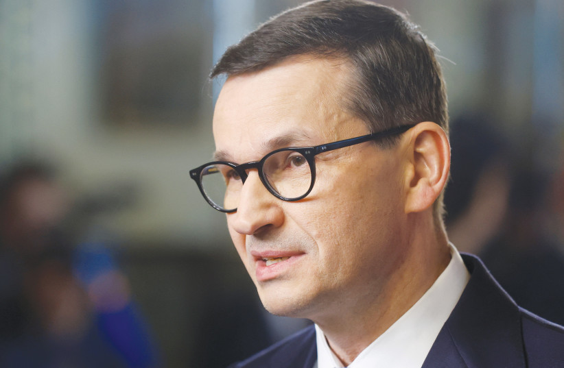  POLISH PRIME Minister Mateusz Morawiecki announced, in 2021, that his government would under no circumstances pay Jews a single zloty, euro or dollar. (credit: JONATHAN ERNST/REUTERS)