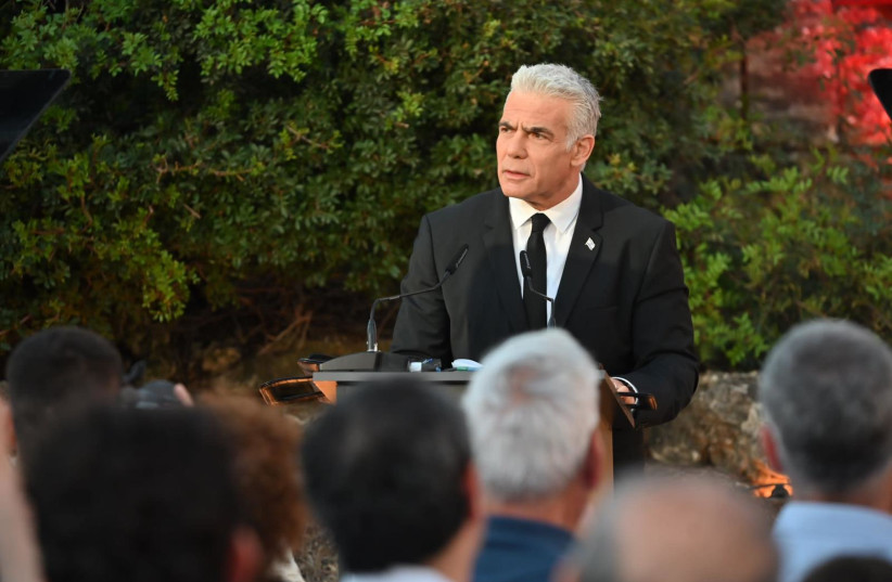  Opposition leader Yair Lapid speaks at a Holocaust Remembrance Day ceremony in Yad Mordechai, April 17, 2023. (photo credit: ELAD GUTMAN)