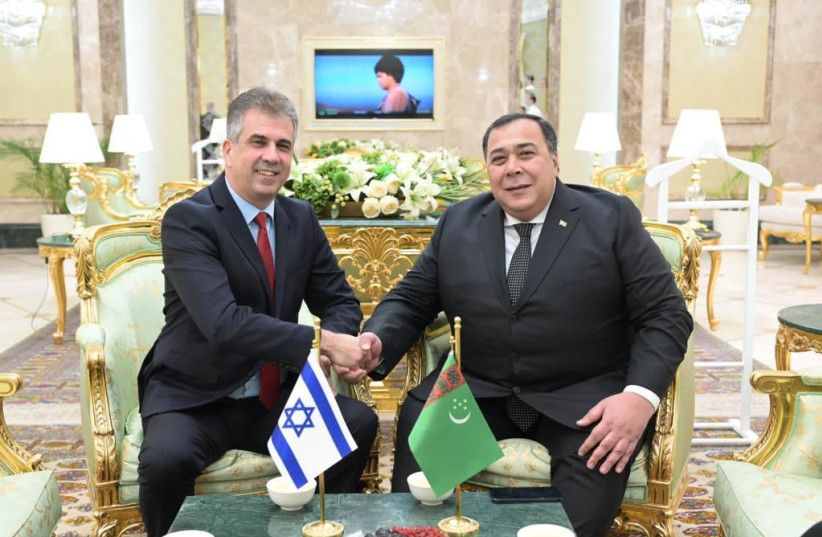  Foreign Minister Eli Cohen seen with Turkmen deputy foreign minister Berrdiniaz Matiev on April 19, 2023 (credit: SHLOMI AMSALEM/GPO)